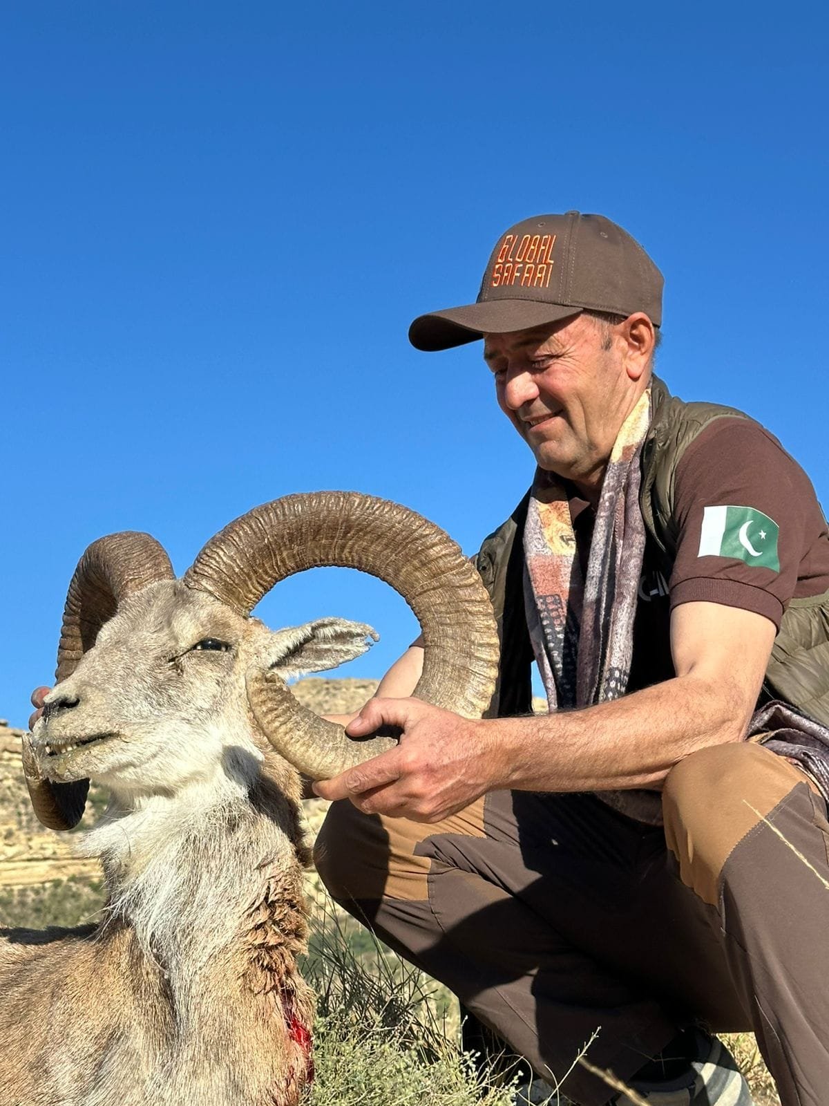 Hunter with Ibex